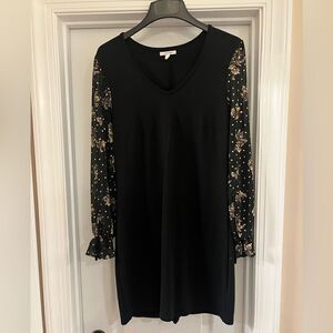 Maurices black dress with sheer floral sleeves and bows size Medium